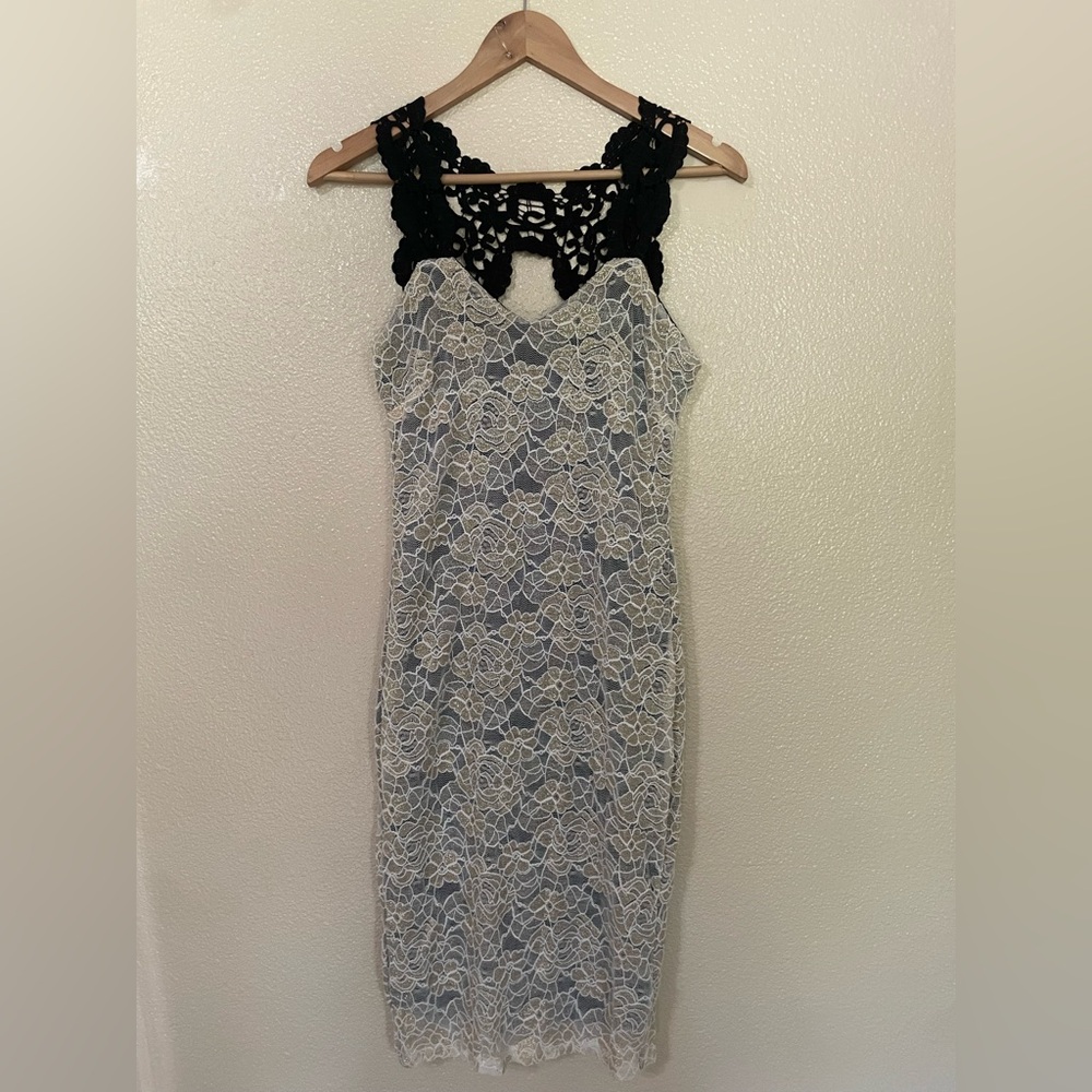 Elegant Lace Dress with Black and Cream Accents